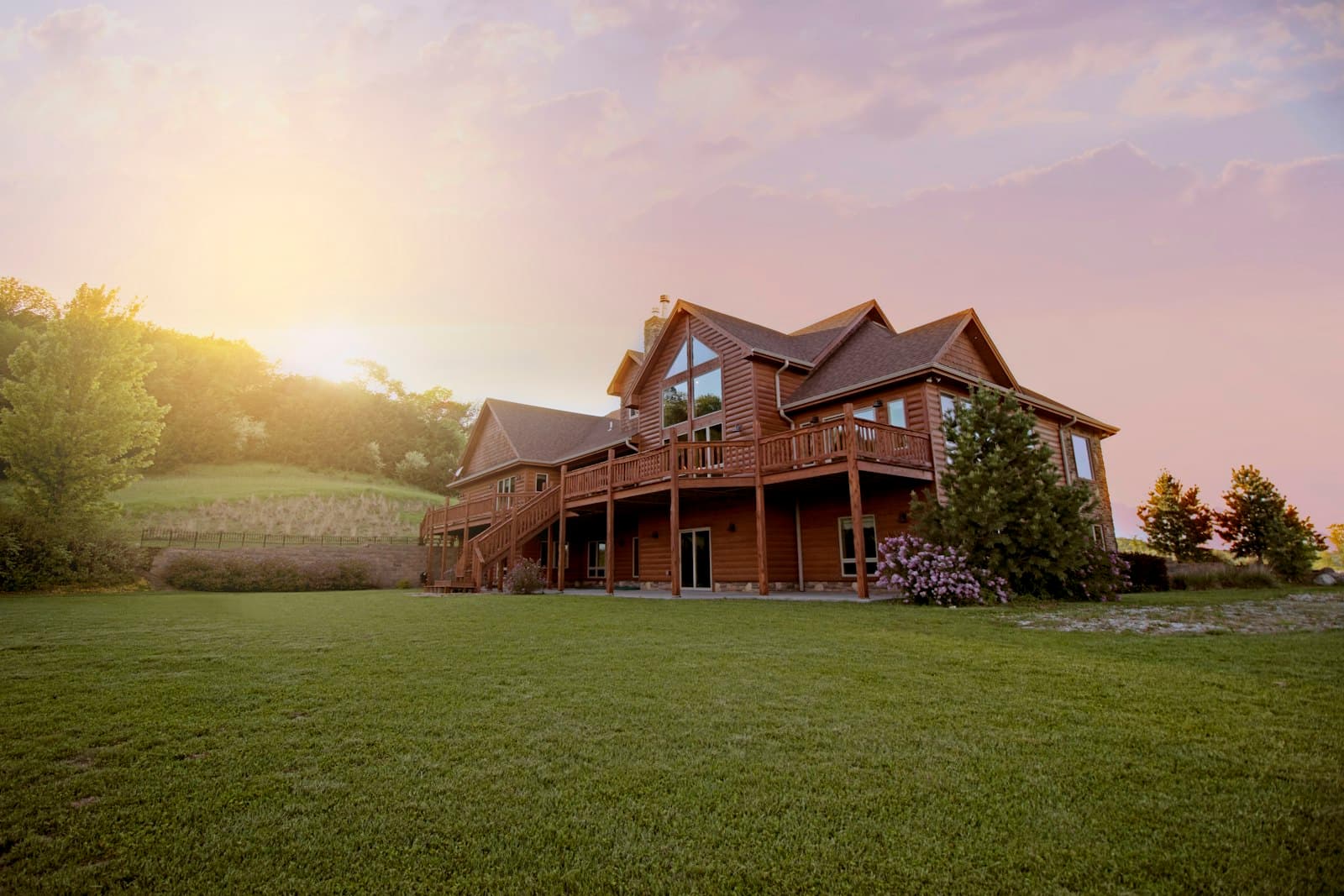 A wooden house at sunset
